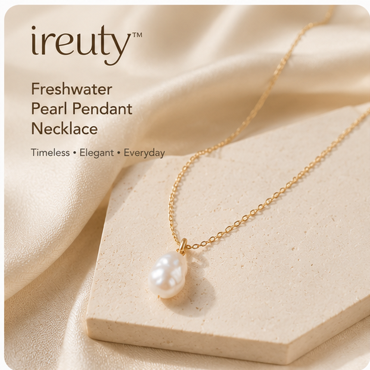 𝒊𝒓𝒆𝒖𝒕𝒚™ freshwater pearl pendant necklace on a neutral stone display