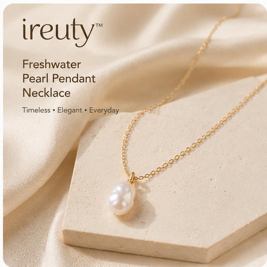 𝒊𝒓𝒆𝒖𝒕𝒚™ freshwater pearl pendant necklace on a neutral stone display